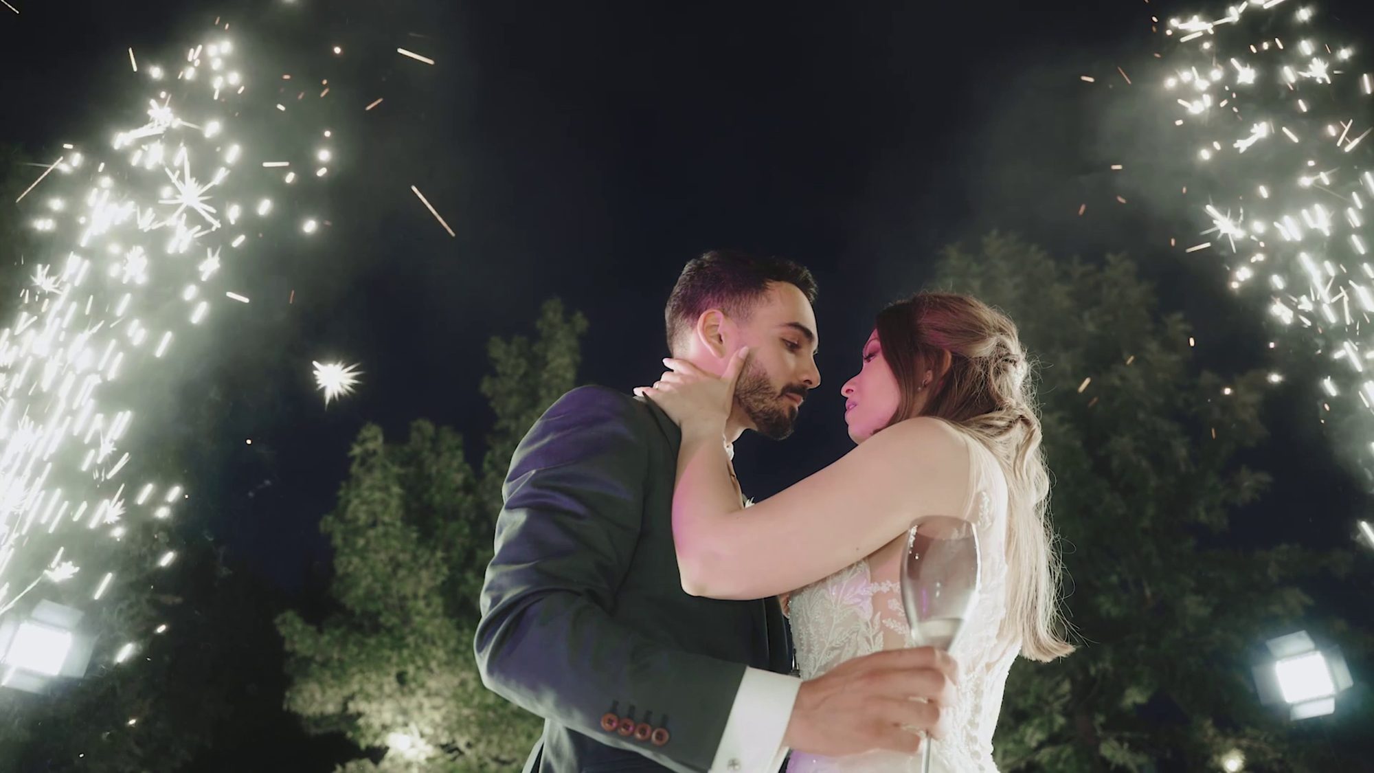 Anna and Sebastian beneath the fireworks