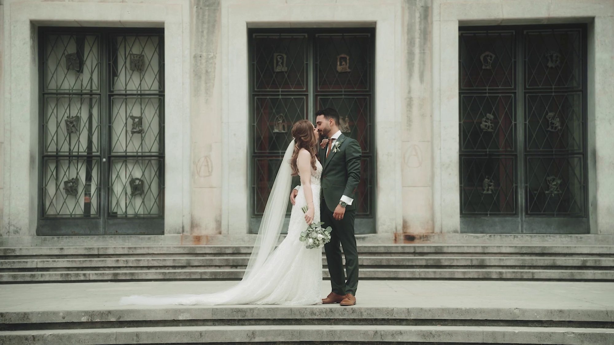 Anna and Sebastian sharing a kiss outdoors